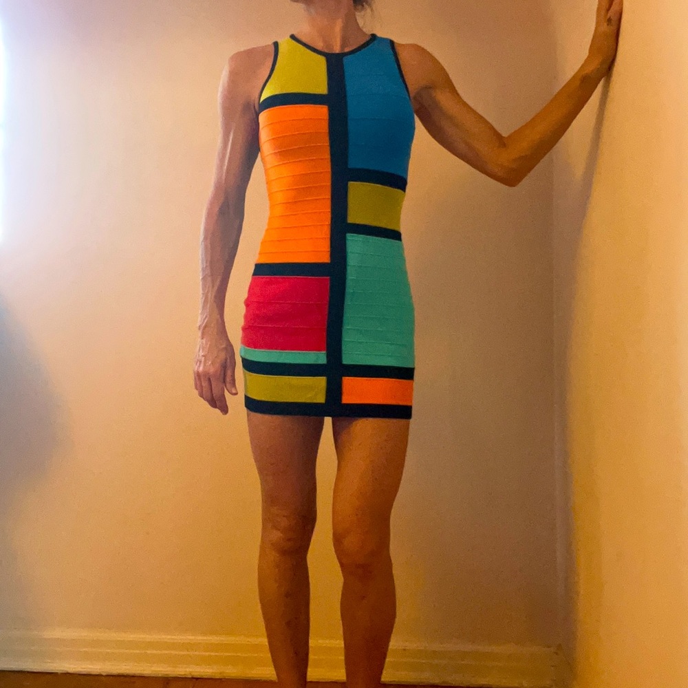 Bright modern 80s style mini skirt dress. Sweater material. Stretchy & comfy!
